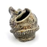 Robert Wallace Martin for Martin Brothers, a stoneware characterful fish spoon warmer