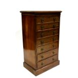 A late Victorian Maple mahogany wellington chest, circa 1880, moulded top over a bank of seven