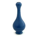 A Chinese double gourd vase, monochrome pastel blue matt glaze, blue four character Qinalong seal