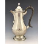 An Edwardian silver hot water jug, Charles Stuart Harris, London 1904