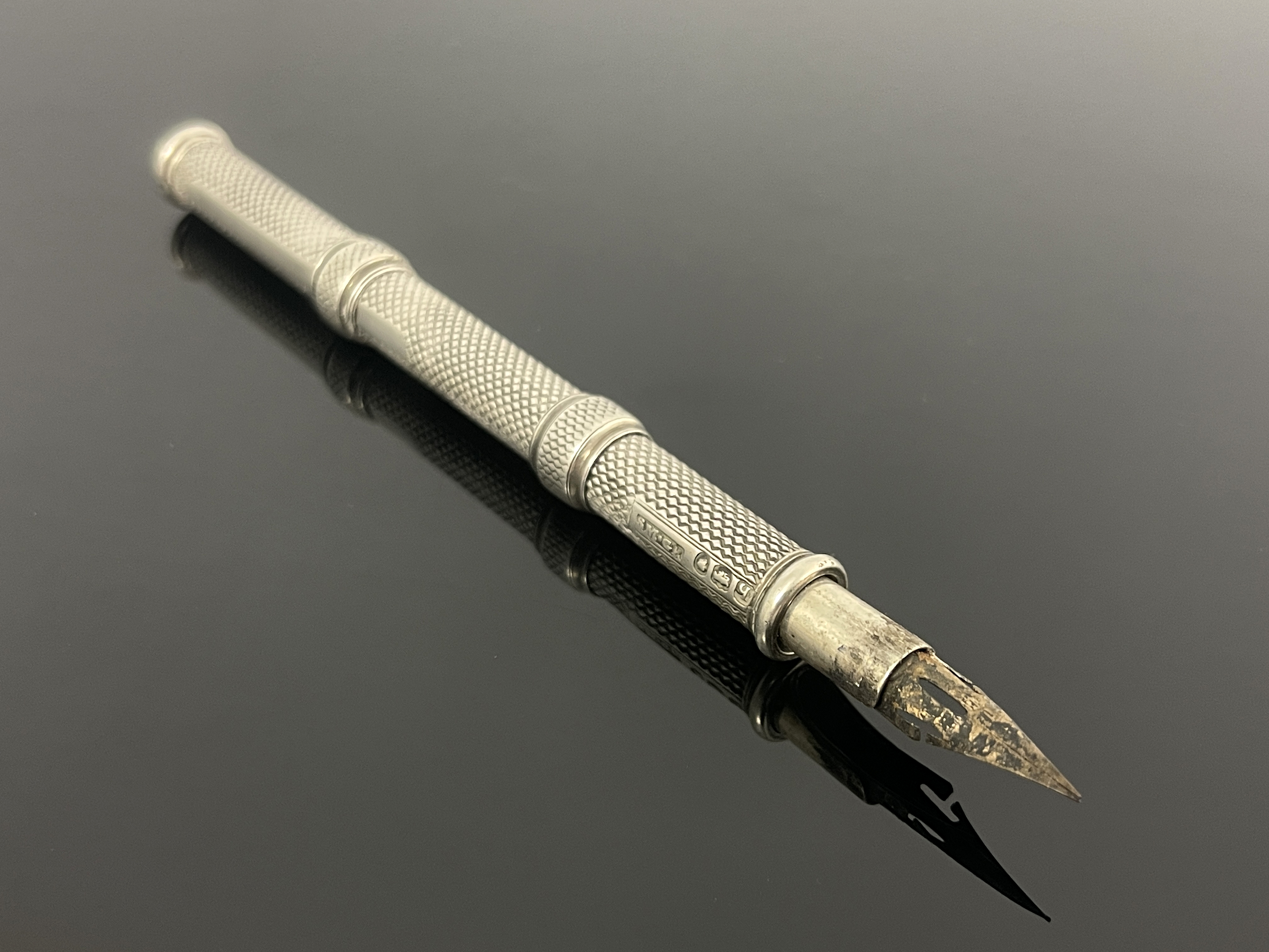 A William IV silver propelling pencil and retractable fountain pen, Sampson Mordan & Gabriel Riddle,