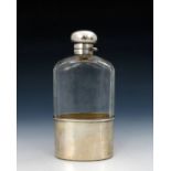 A Victorian silver mounted hip flask, Charles Fox, London 1889, rectangular form with cut glass