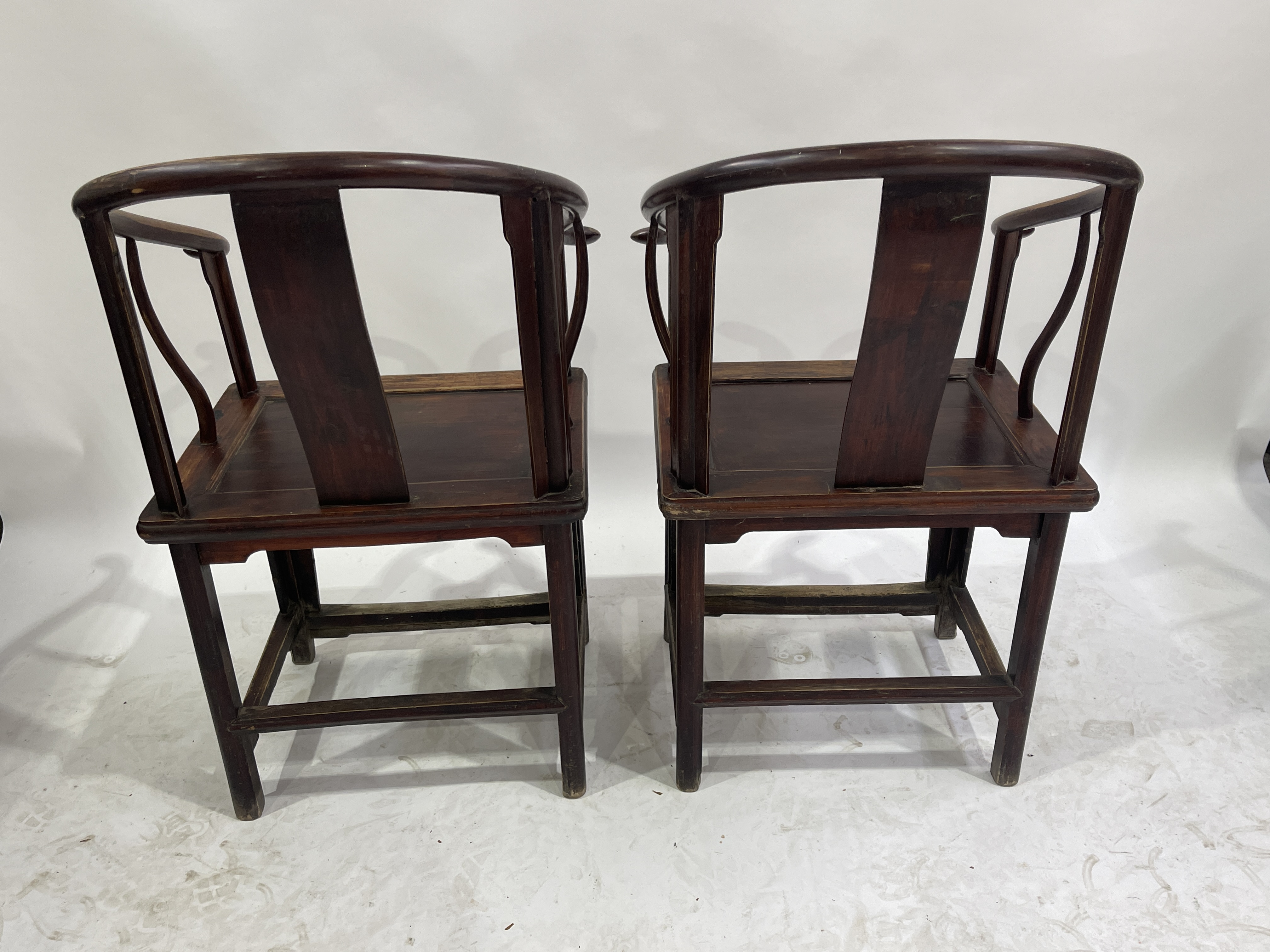 A pair of Chinese horseshoe-back wooden armchairs, North China, late Qing Dynasty, curved and - Image 2 of 7