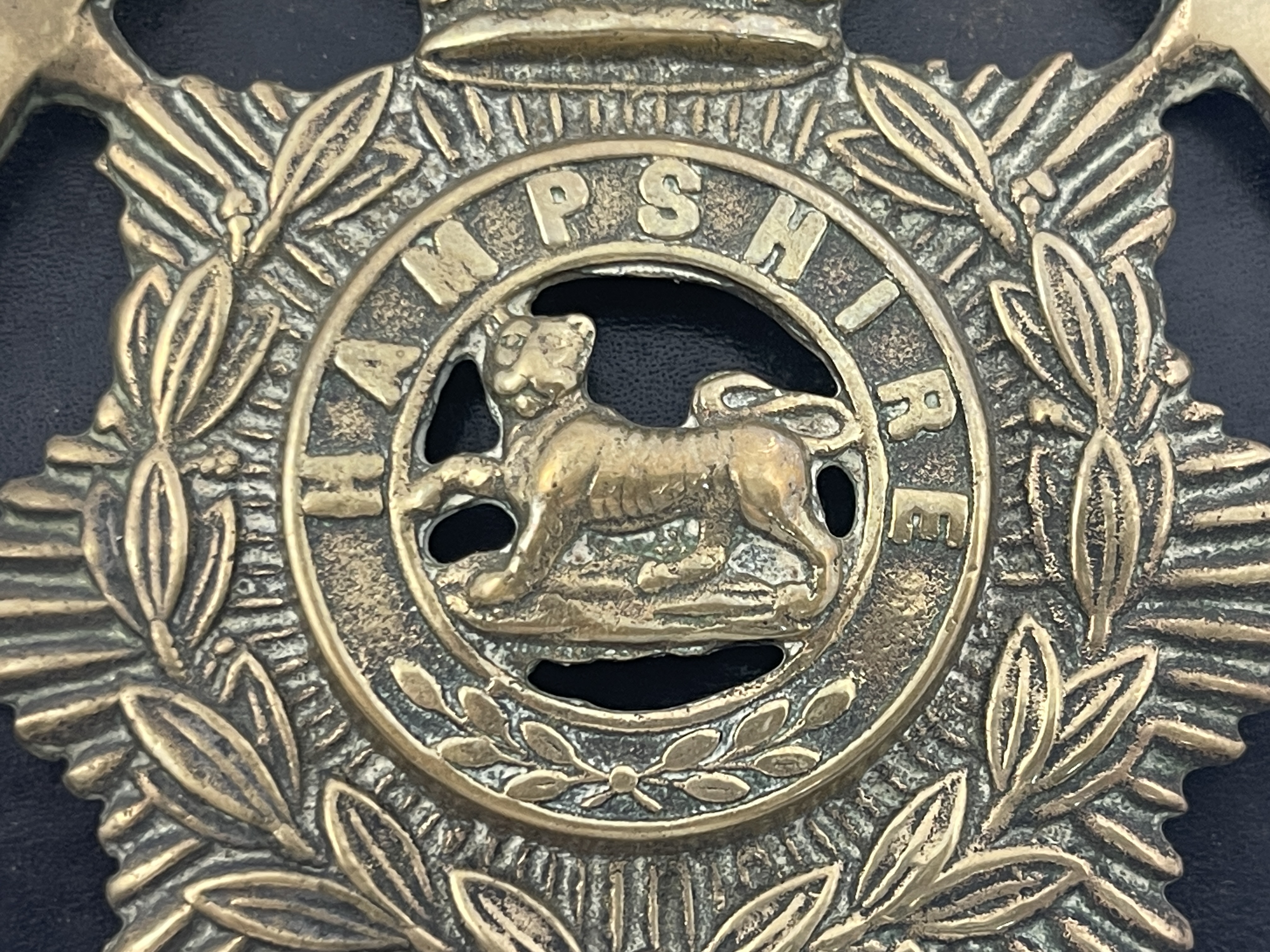 A Victorian Hampshire Regiment martingale badge/horse brass, mounted on leather backing with - Bild 3 aus 3