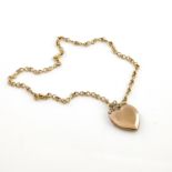 A 9ct gold heart shaped locket, on a fine kerb-link chain