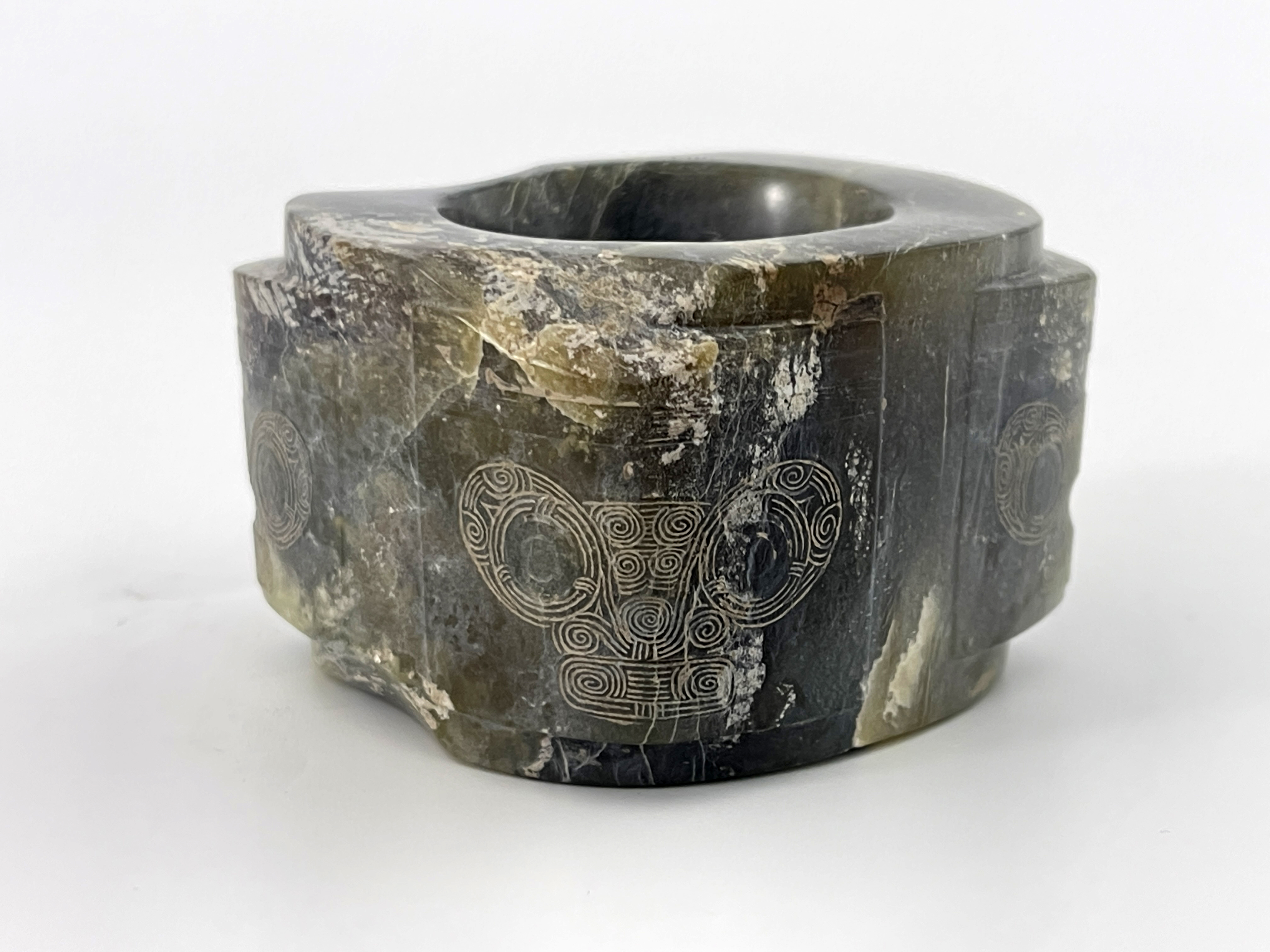 A Chinese polished hardstone ring. engraved decoration to each corner, 6 by 6cm - Image 3 of 3