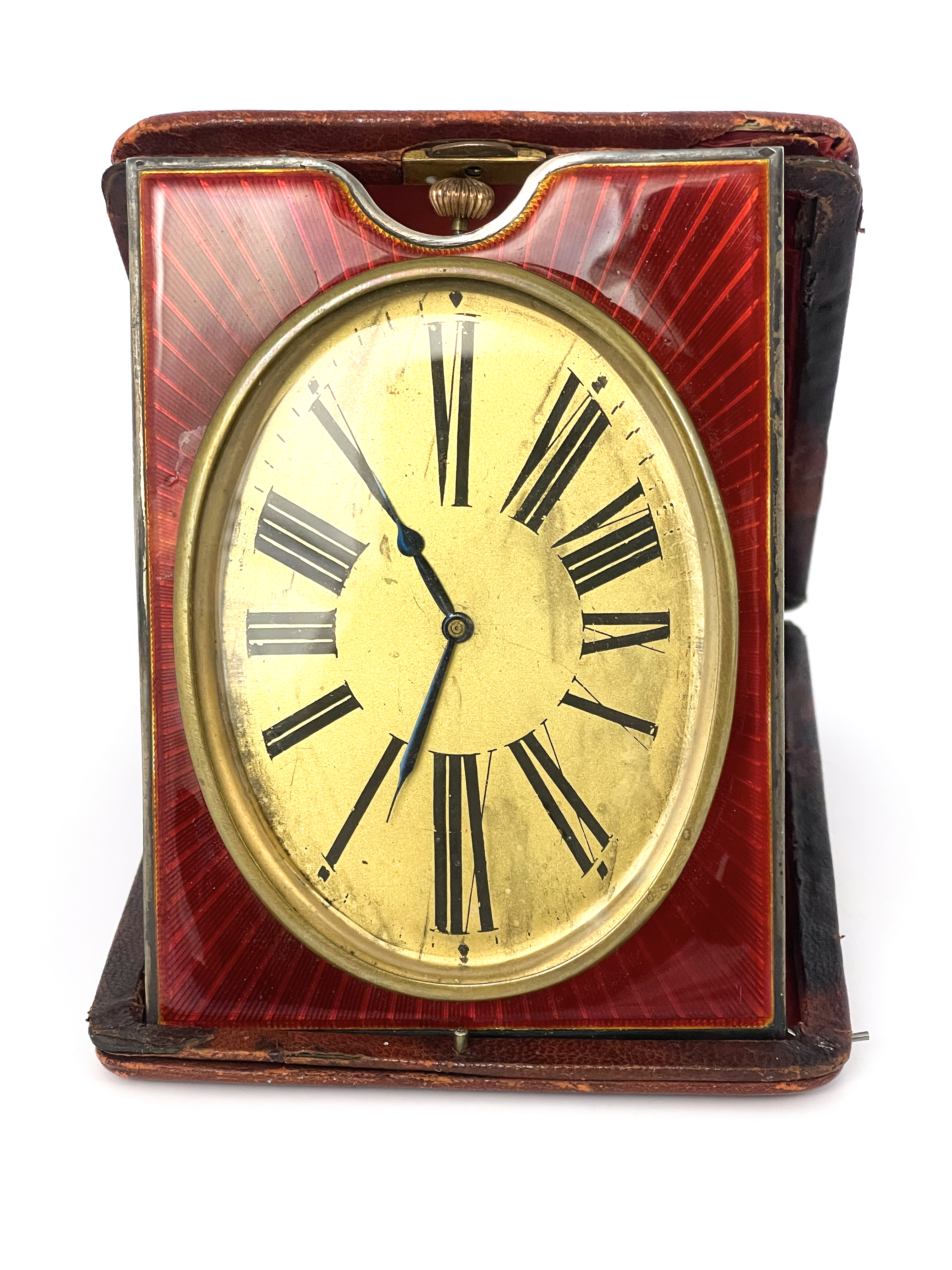 An easel travel timepiece, early 20th Century, red leather outer case, oval gilt dial with Roman - Image 3 of 4