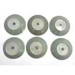 A set of twelve Chinese celadon ground famille rose plates, enamelled with butterflies and