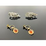 A pair of 9 carat gold and amber cabochon earrings, together with marcasite clip earrings