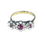 An 18 carat gold ruby cluster ring