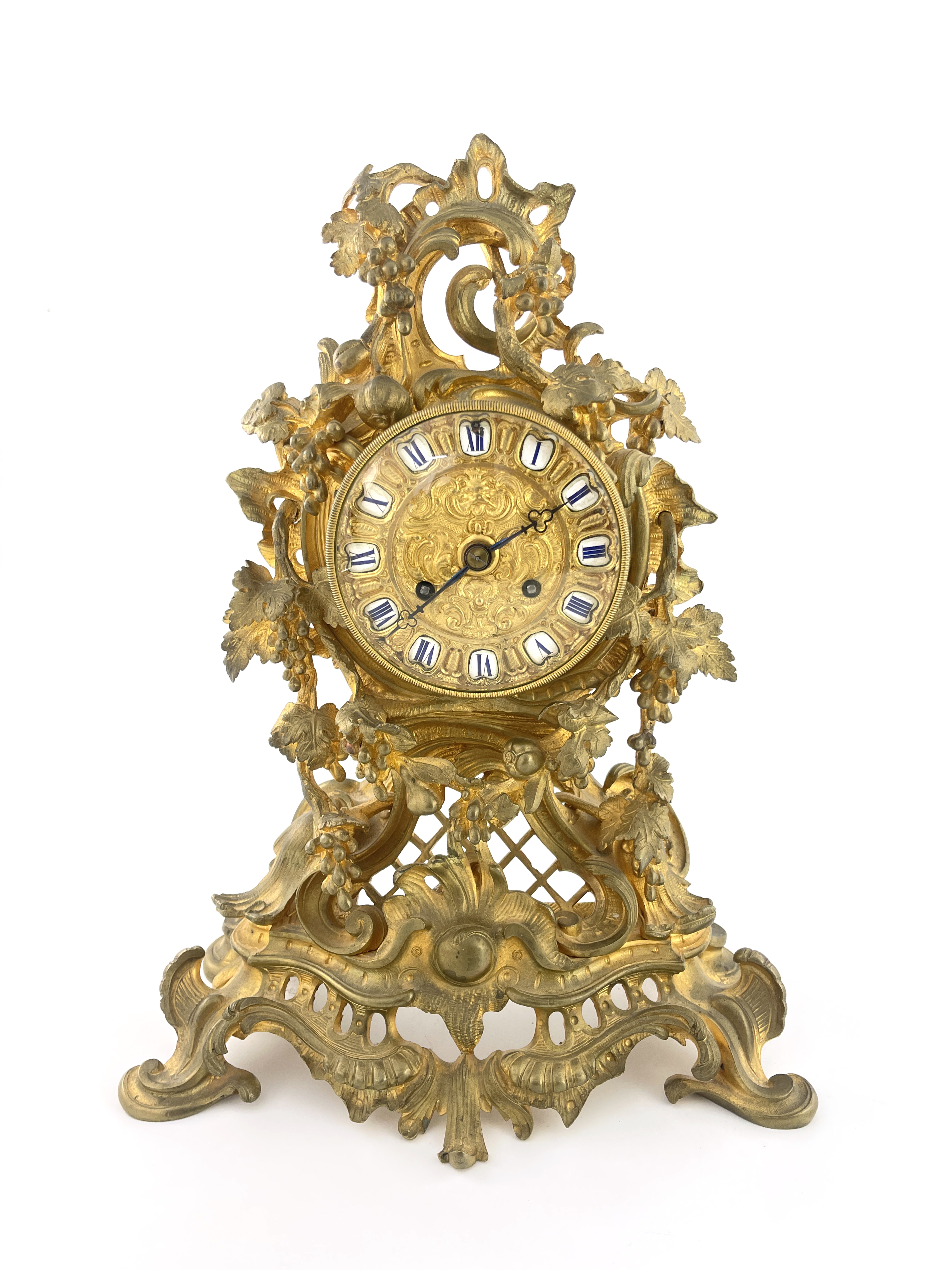 Raingo Freres, a mid 19th century French ormolu and gilt brass mantel clock, relief moulded Rococo