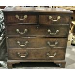 A George III country oak chest of drawers of small proportions, circa 1800, moulded top, two short
