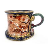 Miles Mason Ironstone octagonal porter mug, painted in the Imari palette with moulded dragon handle,