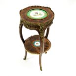 A 19th century French kingwood crossbanded and ormolu mounted two tier occasional table; with