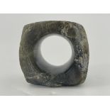 A Chinese polished hardstone ring. engraved decoration to each corner, 6 by 6cm