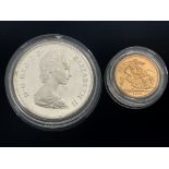 A Royal Mint two-coin commemorative set, to include a 1981 full gold proof sovereign, and a