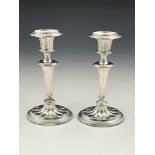 A pair of Edwardian silver candlesticks, Asprey and Co, London 1902