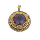 A 9ct gold and amethyst pendant, the central facet cut stone within milled and rope-twist wreath