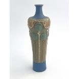 Francis Pope for Doulton Lambeth, a stoneware vase, slender shouldered form, modelled in relief with