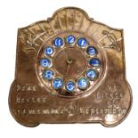 An Arts and Crafts copper and enamelled wall clock, repousse embossed with motto hearts remember the