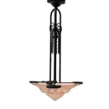 A French Art Deco wrought iron and pink glass pendant light fitting, in the style of Majorelle