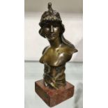A LeBlanc, Cleopatra, a bronze figural bust, on red marble base, signed in cast, 23cm high