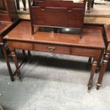 A mahogany aesthetic side table fitted single drawer, on turned and ring carved supports, and