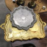 An antiqued gilt metal tray, rectangular ogee fluted border with twin handles, 55cm long, together