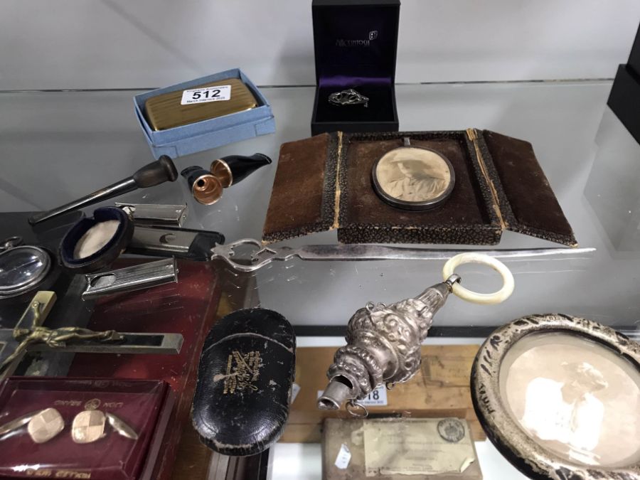 Silver including photo frames, baby's rattle, letter opener, cheroot holders and sundry effects etc
