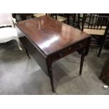 A George III mahogany crossbanded sofa table, fitted single drawer on turned supports and brass caps