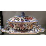 A Gien faience tureen and stand, painted with peony design, 46cm long