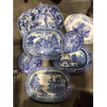 A collection of Staffordshire blue and white plates, including Rogers, Handley Village Fishermen,