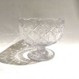 A cut glass pedestal bowl, hobnail and star cut decoration and castellated rim, and another example,