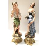 A large pair of Capodimonte figures, modelled as peasants, 63cm high (2)