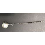 A George III silver mounted toddy ladle, London 1771, shaped spout, with twisted whale bone