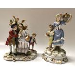 A Capodimonte figure group, woman with fruit basket and child, on rockwork and gilded C Scroll base,
