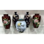 Two pairs of Japanese cloisonne enamelled vases and another, one red metallic ground with roses, the