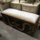A carved gilt wood window seat, 120cm wide