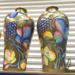 A large pair of Italian gilt ground vine painted vases, Meiping form, signed indistinctly 50cm high