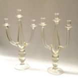 A pair of blown glass triple sconce candlesticks, on knopped stem and circular foot, 54cm high (2)