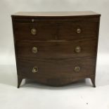 A 19th Century mahogany bowfront chest two short over three Long drawers, fitted brushing slide,