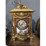 A gilt metal and painted porcelain bracket clock, in the French/Louis XVI style. the central panel