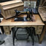 Jones of Manchester treadle sewing machine No.138166, of fitted wooden stand and metal base