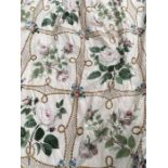 A pair of professionally made curtains; glazed cotton, white rose and spring flower panels, with