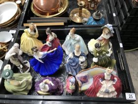 A collection of Royal Doulton ladies, including Be