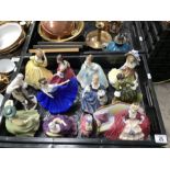 A collection of Royal Doulton ladies, including Be