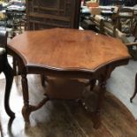 An Edwardian octagonal two tier occasional table and a piano stool