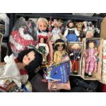 A collection of 20th century dolls in various nati