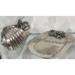 A silvered metal relief moulded aquatic bowl and tray, modelled as shells and underwater sea