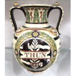 A Thune art pottery twin handled vase, 1897, sgraffito decorated, 30cm high